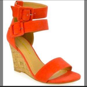 Orange strappy orange wedges